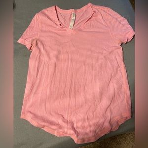 Pink Lululemon striped running shirt. Size 4.